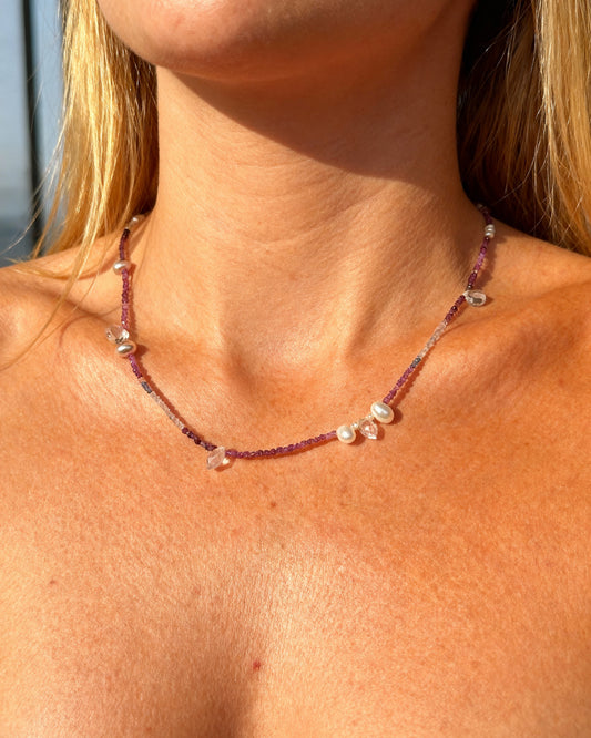 Colorful spinel gemstone necklace with topaz, rose quartz, and freshwater pearl droplets in between.
A specially designed piece that is unique and dainty while being colorful and eclectic.